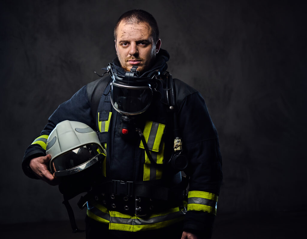 firefighter dressed in uniform holds safety helmet 2023 11 27 05 13 39 utc AM Healthcare