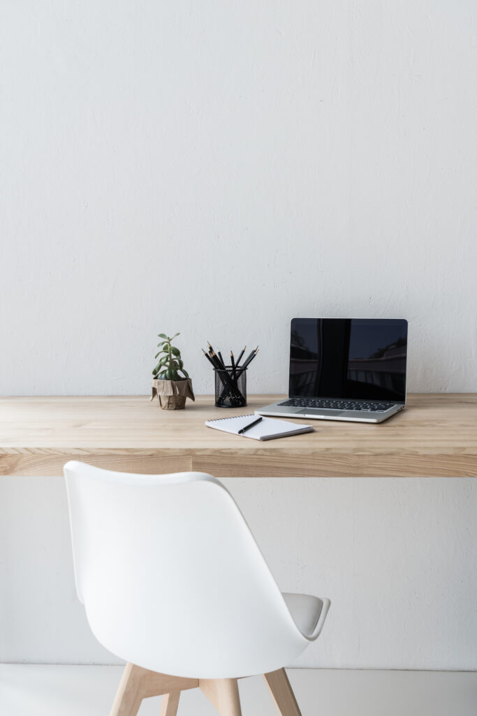 Clean, organized desk, representing daily strategies for adults with ADHD to enhance focus and productivity by minimizing distractions.