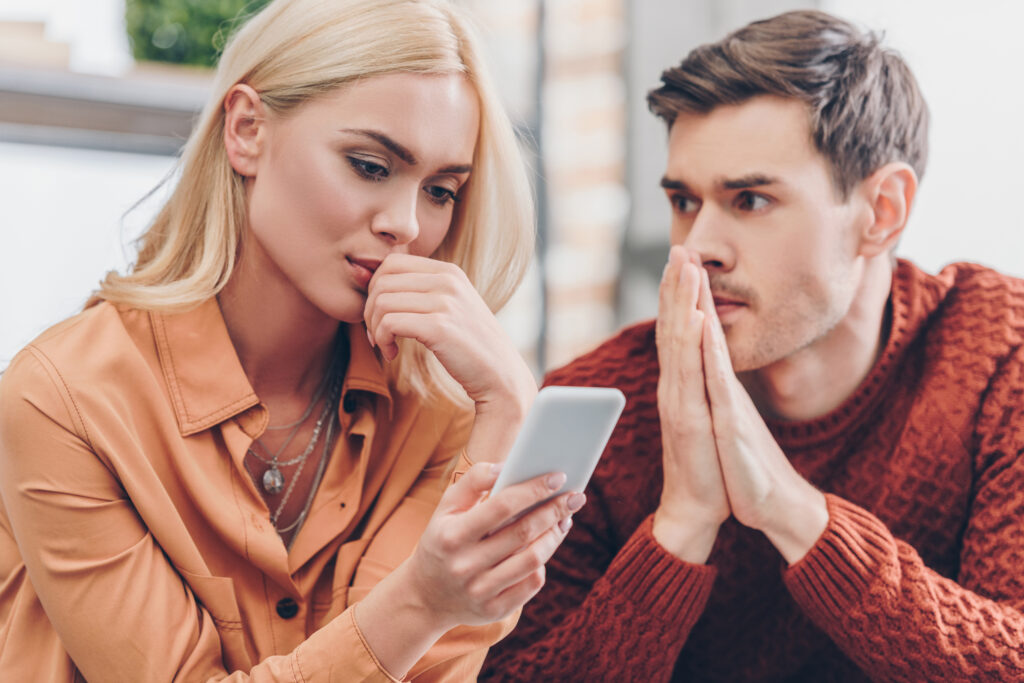 Person distracted by phone while loved one tries to connect emotionally