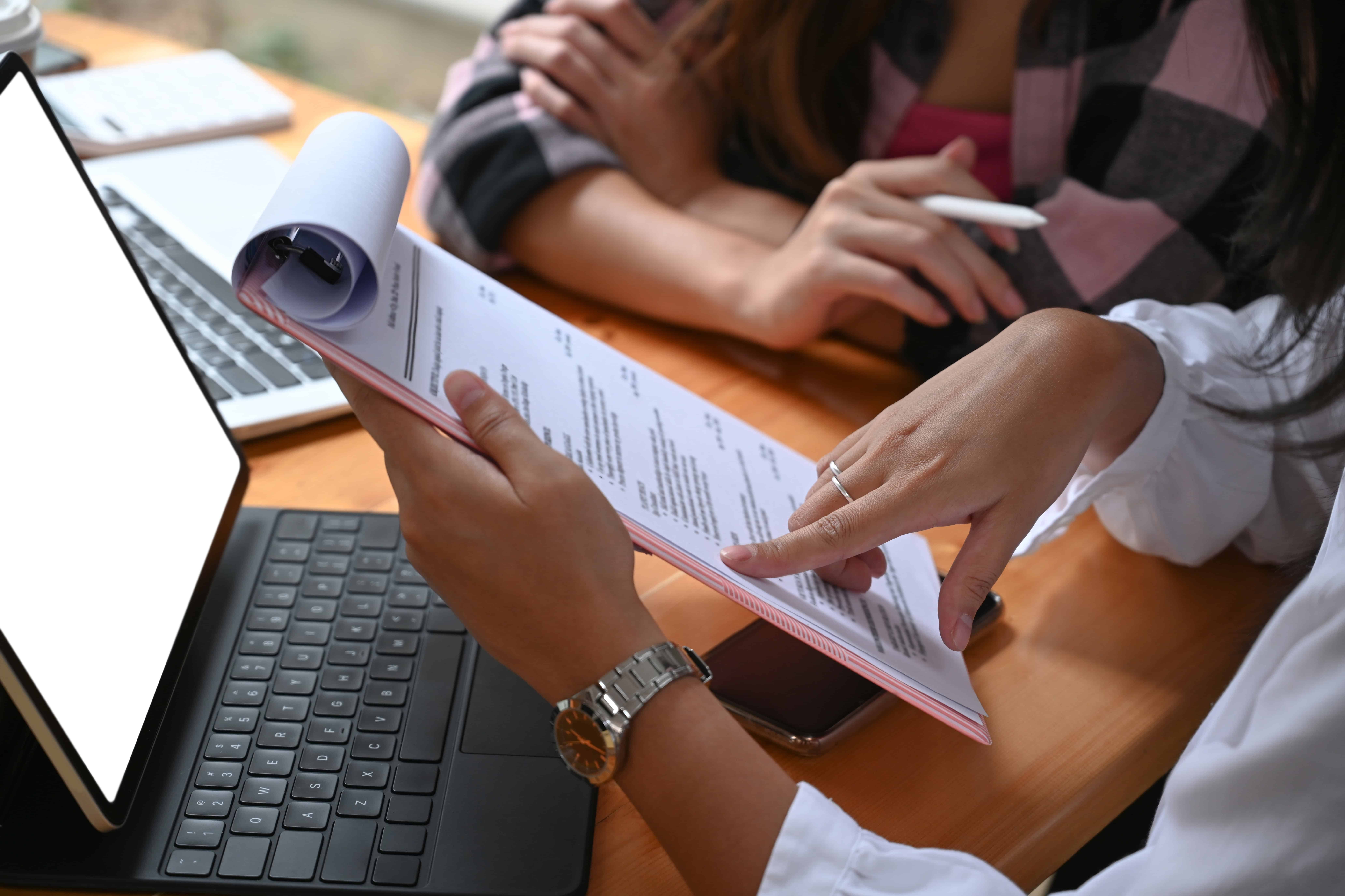 Admissions specialist reviewing insurance coverage for alcohol detox in California