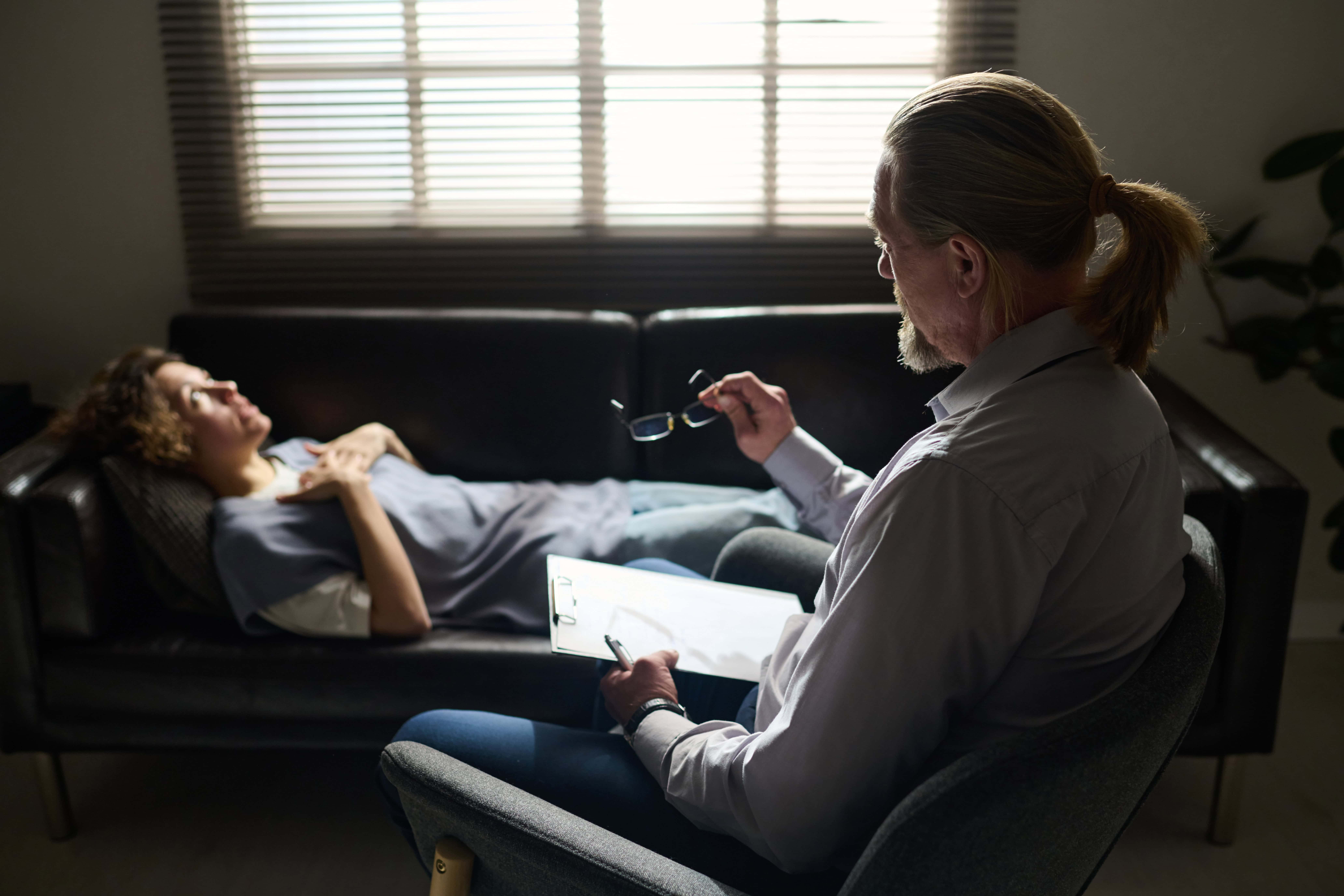 Therapist providing PTSD treatment in Los Angeles to a client during a trauma counseling session