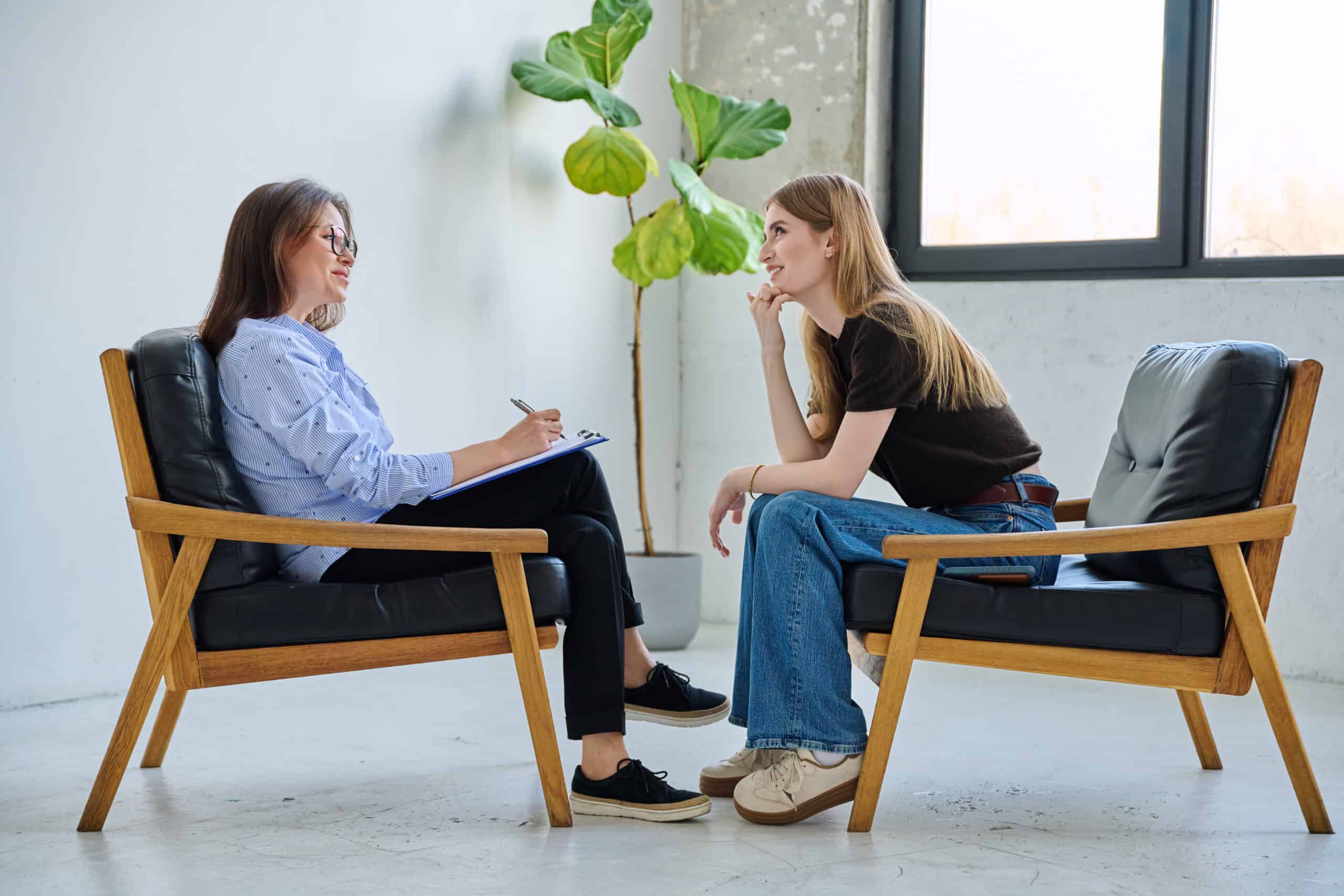 Person talking with a treatment professional about meth use and recovery options