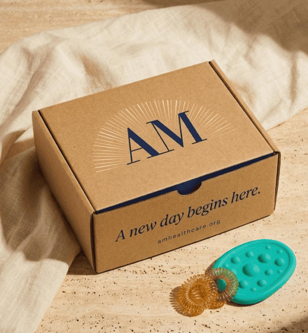 A sensory kit with stress ball, sensory ring, and candies